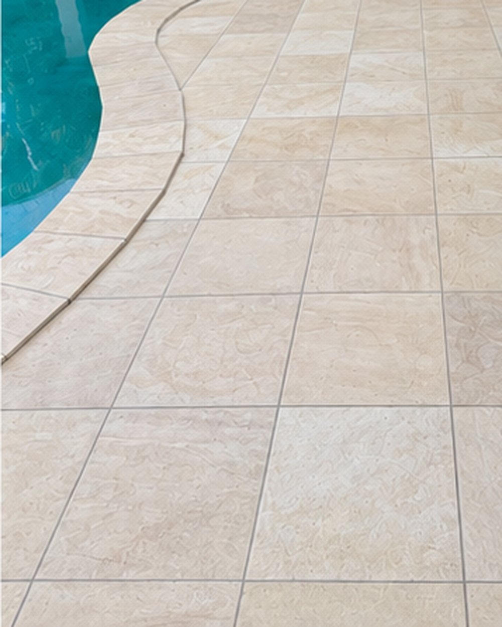 The same pool surround after cleaning — pavers back to natural sandstone